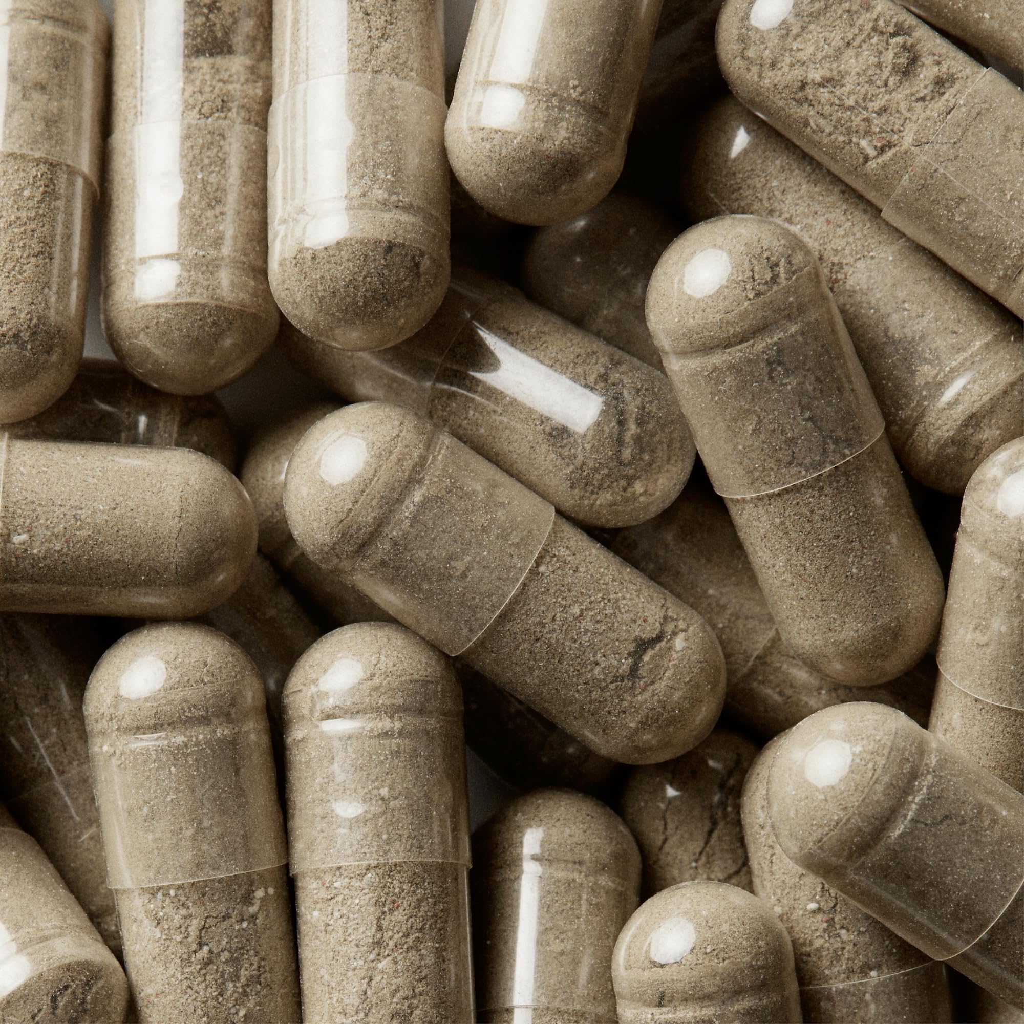 Close-up of WELLBEL Women supplement capsules