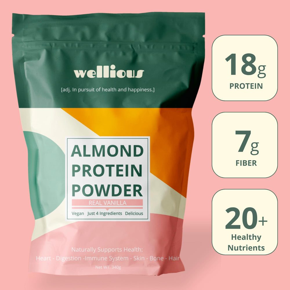 Vanilla almond protein powder scoop with powder