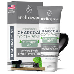 Wellnesse Activated Charcoal Toothpaste with mint flavor in tube