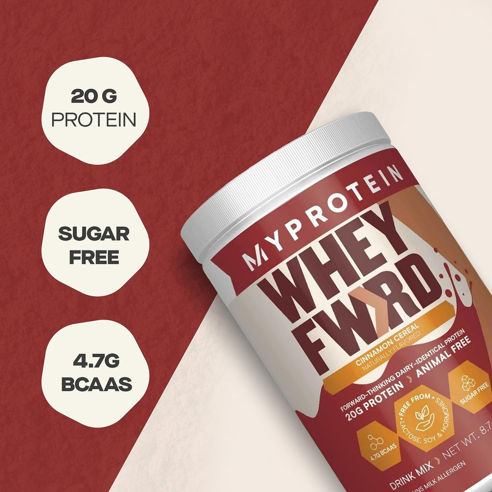 Scoop pouring protein powder into a glass for a shake