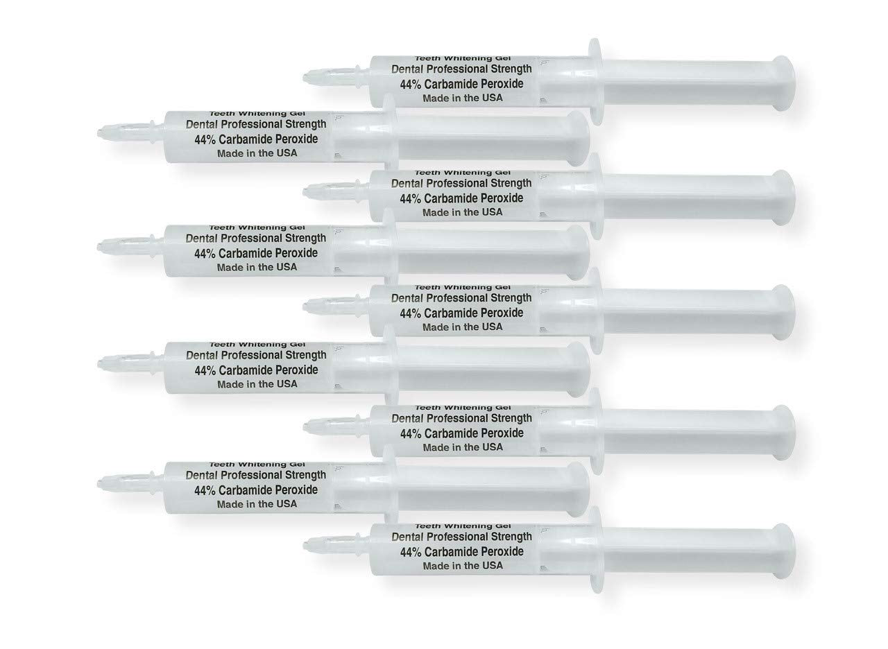 Close-up of White Teeth Global 44% carbamide peroxide whitening gel syringe (1 of 2).