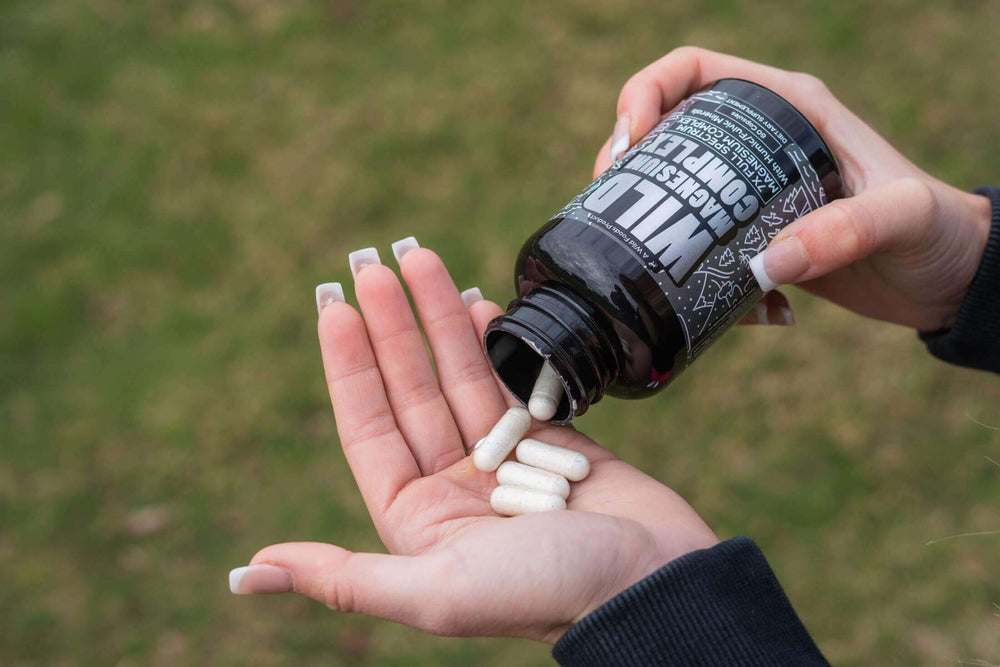 Flat lay of magnesium complex packaging with capsules