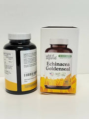 Detail shot of capsules next to bottle for product emphasis