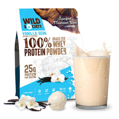 Wild Society vanilla bean powder scoop shows creamy shake texture for quick protein boost.