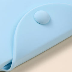 Bottom view highlighting eight vent holes for airflow and drying