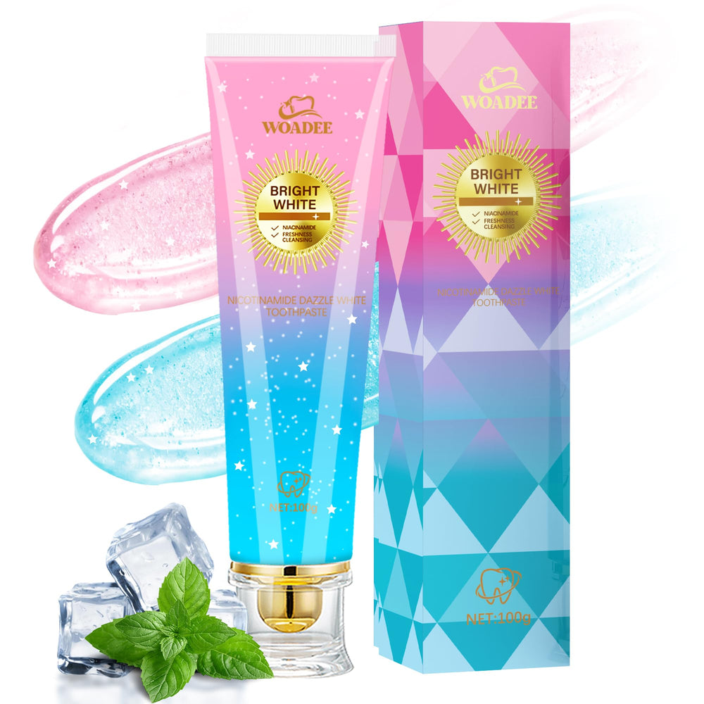 Bottled Woadee Niacinamide Whitening Toothpaste with mint leaves