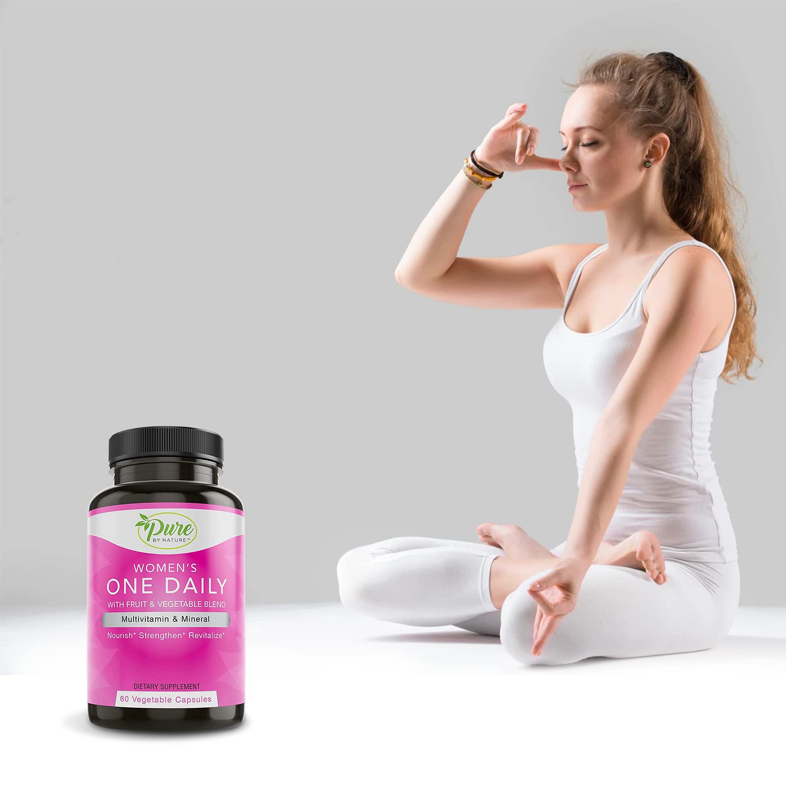 Woman taking a daily multivitamin for wellness and vitality