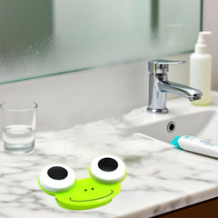 Green frog-shaped contact lens case – side view
