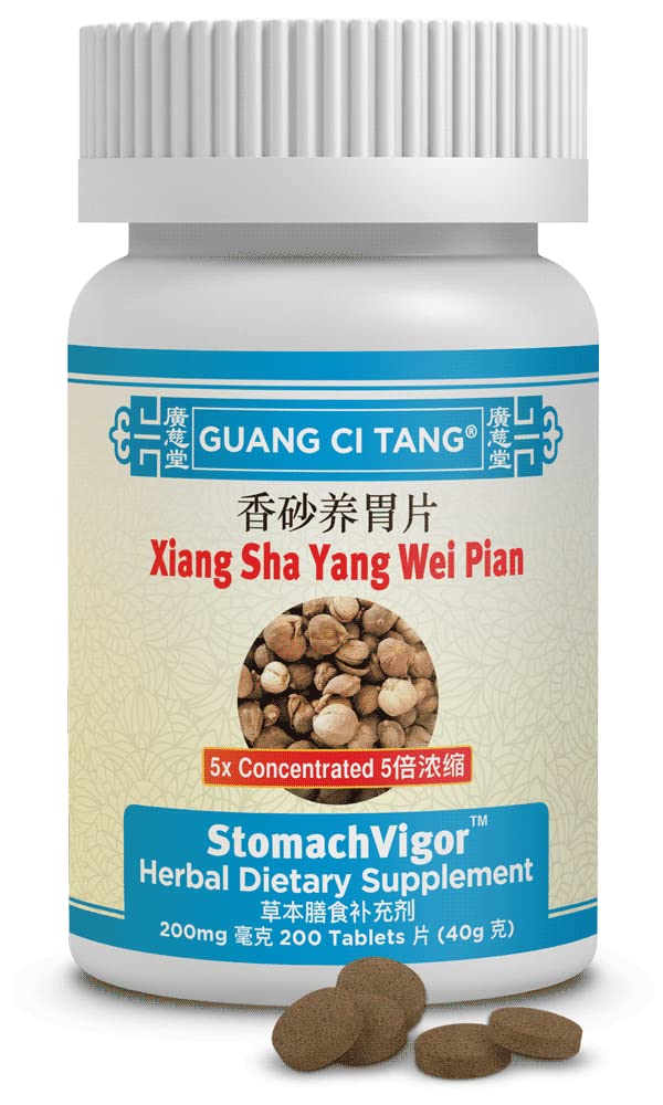 Xiang Sha Yang Wei Pian Guang Ci Tang bottle with pills