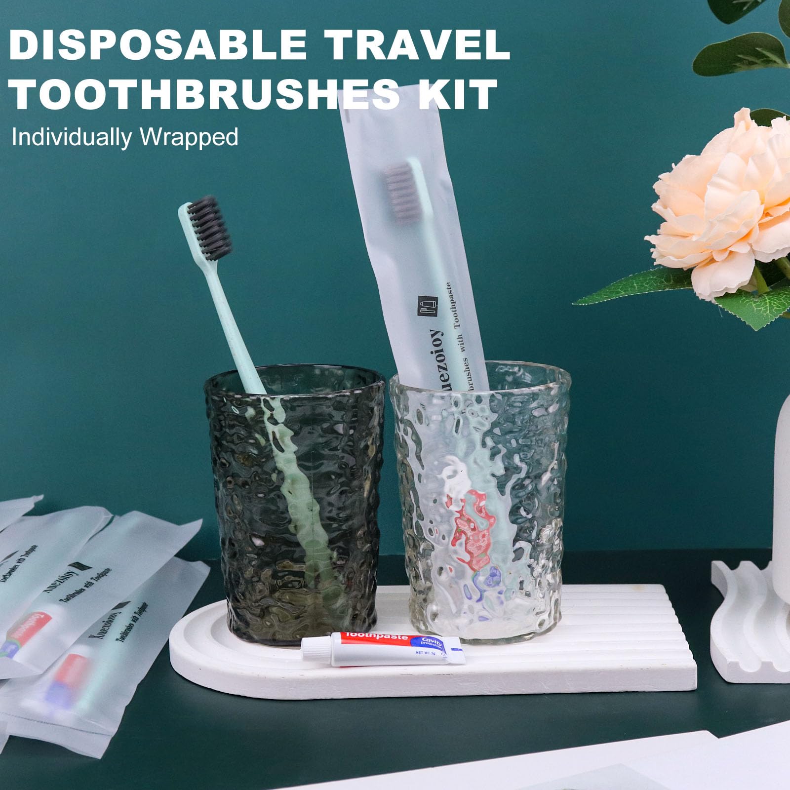 Hotel hospitality supplies: individually wrapped toothbrushes and toothpaste