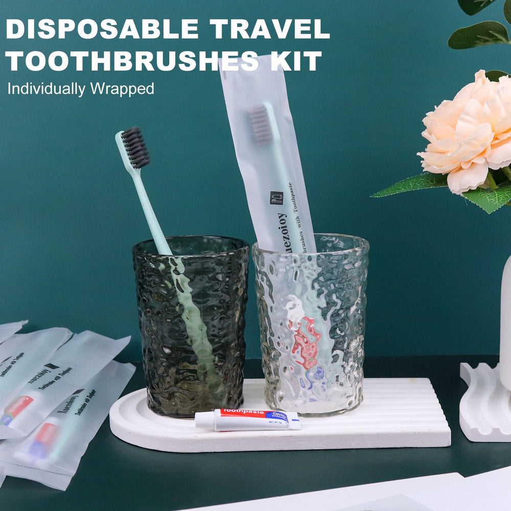 Hotel hospitality supplies: individually wrapped toothbrushes and toothpaste