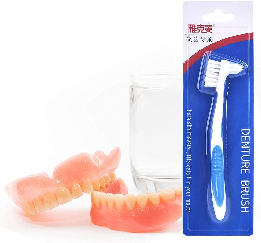 User using the denture cleaning kit to soak dentures