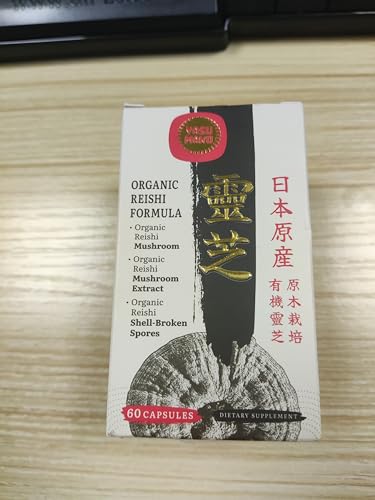 Organic Reishi mushroom capsules in glass bottle