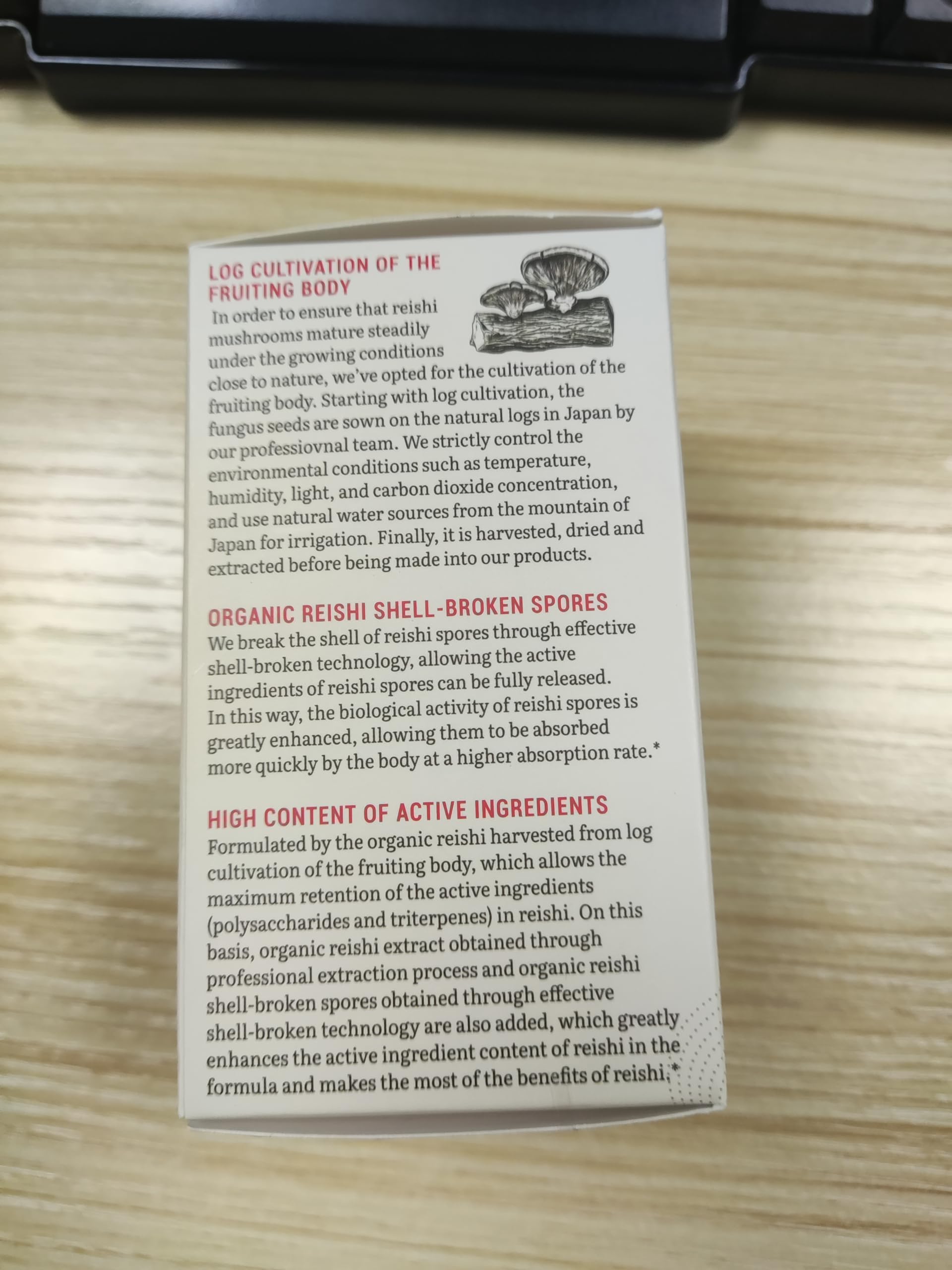 Reishi capsule arrangement on white background