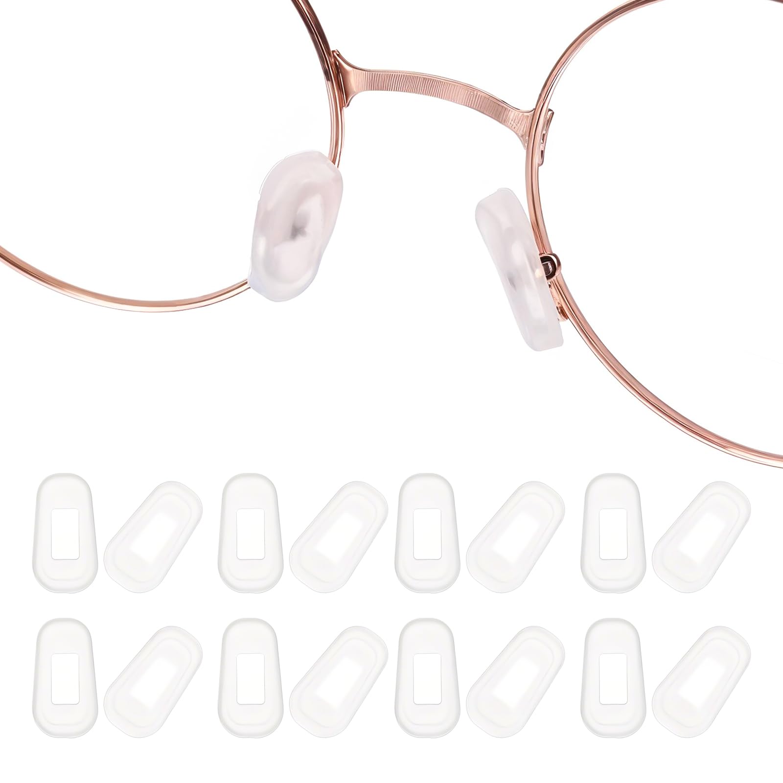 Transparent white silicone eyeglass nose pads displayed on a white background
