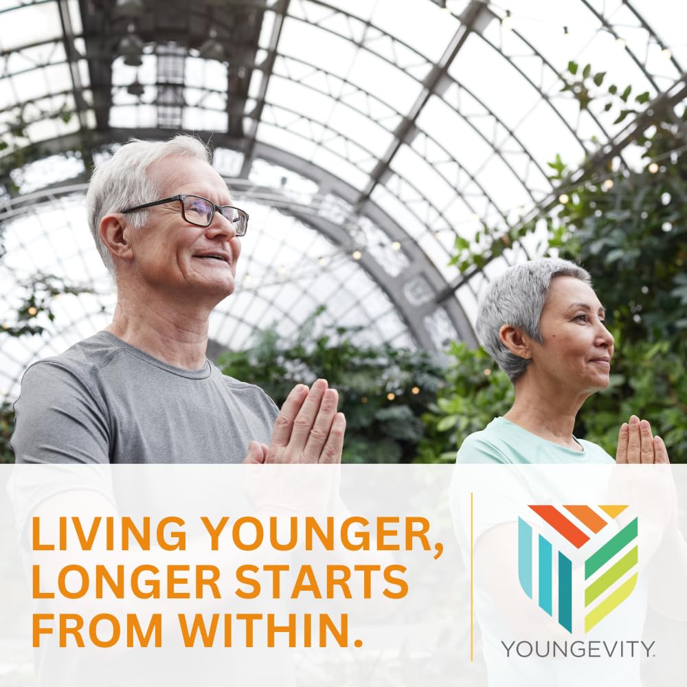 Serving idea showing a glass of juice and the Tangy Tangerine 2.0 bottle