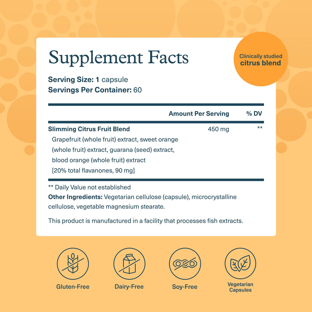 Close-up of citrus fruit components showing juice, peels and seeds