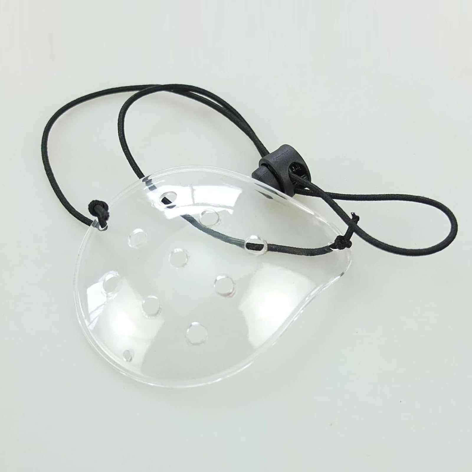 Eye shield laid flat to demonstrate smooth edge and hygiene