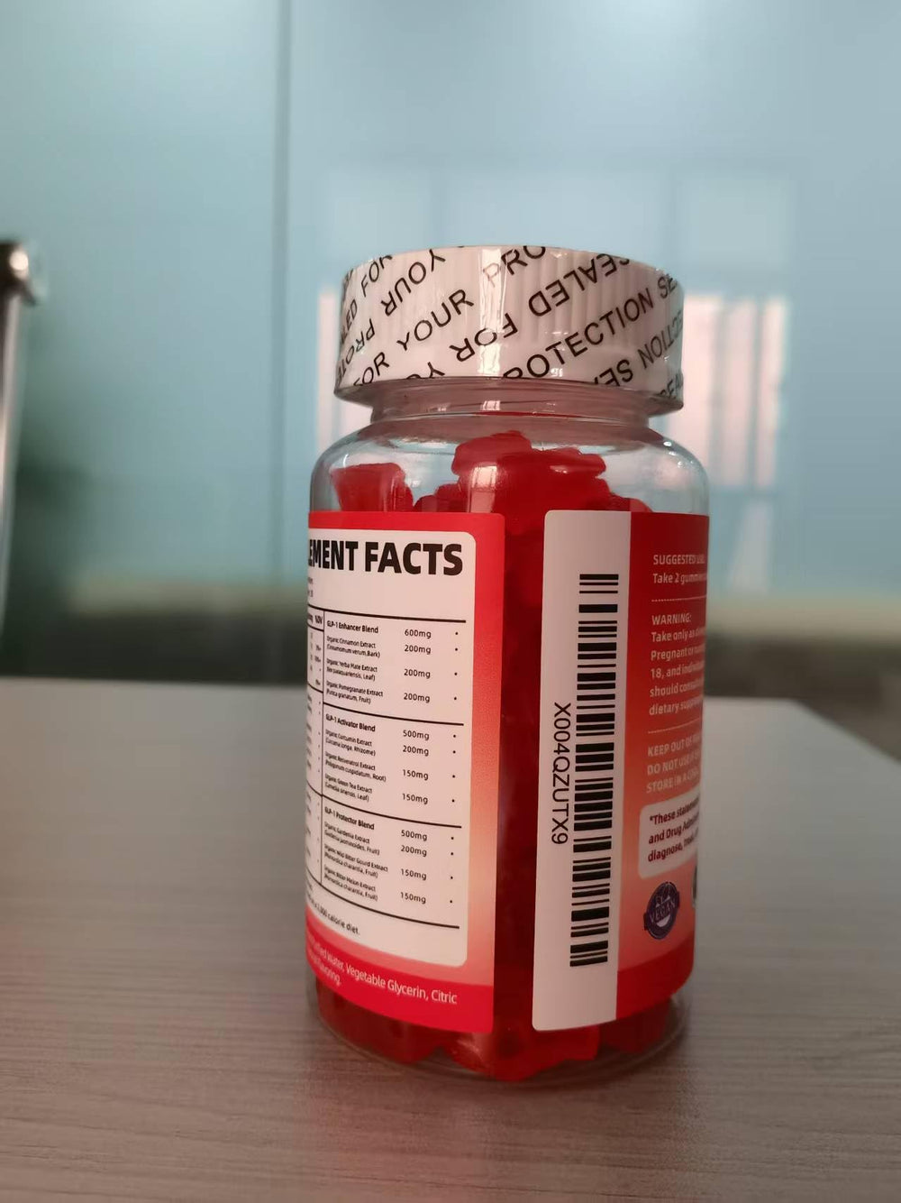 Vegan, gluten-free, non-GMO gummies in GMP facility label