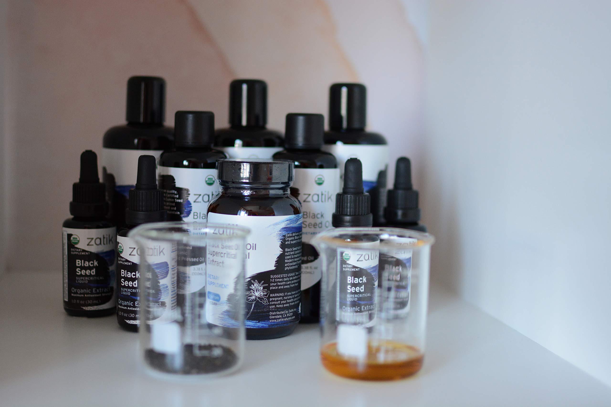 Black seed oil applied to hair and skin