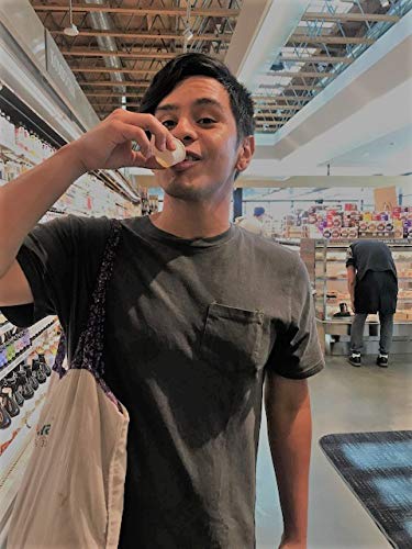 Ultraviolet glass bottle packaging against white background