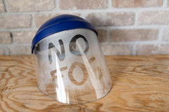 Anti-fog spray being applied to eyeglass lenses