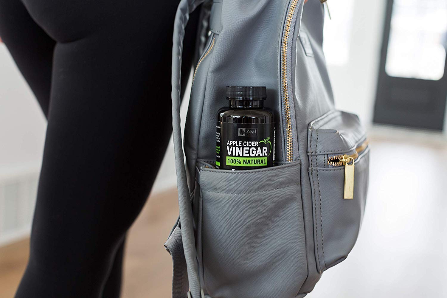 Zeal Naturals ACV capsules on a breakfast tray suggesting daily routine.