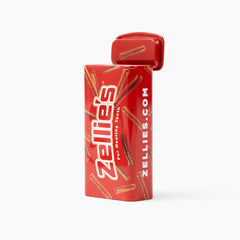 Zellies On-The-Go Tin placed in a purse to show portability and size.
