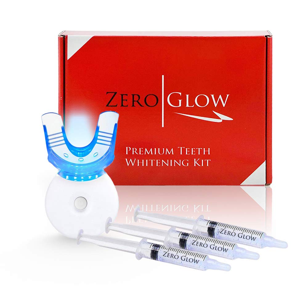 Zero Glow Teeth Whitening Kit contents: 3x 3ml carbamide peroxide gel syringes, trays, and LED light