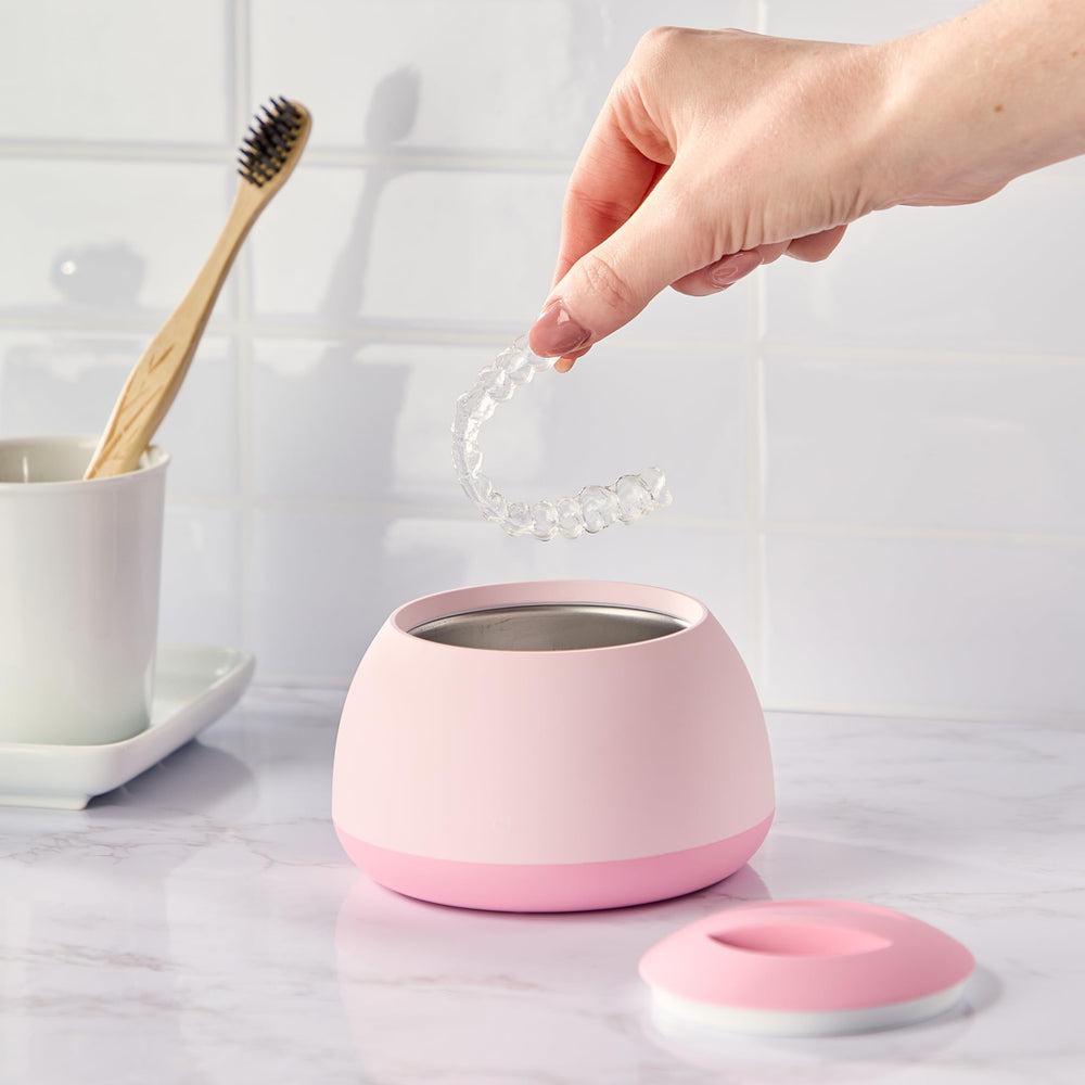Zima Dental Pod used for cleaning retainers and aligners