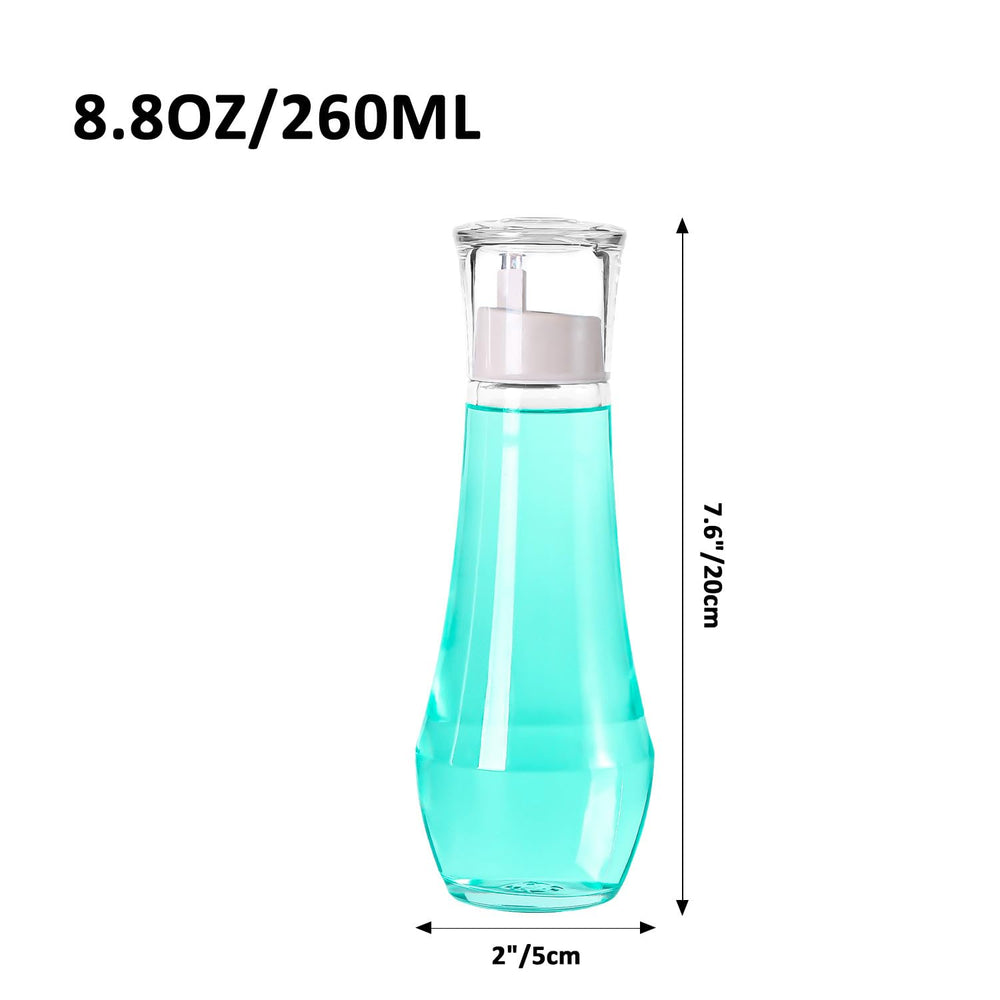 Set of two glass mouthwash bottles